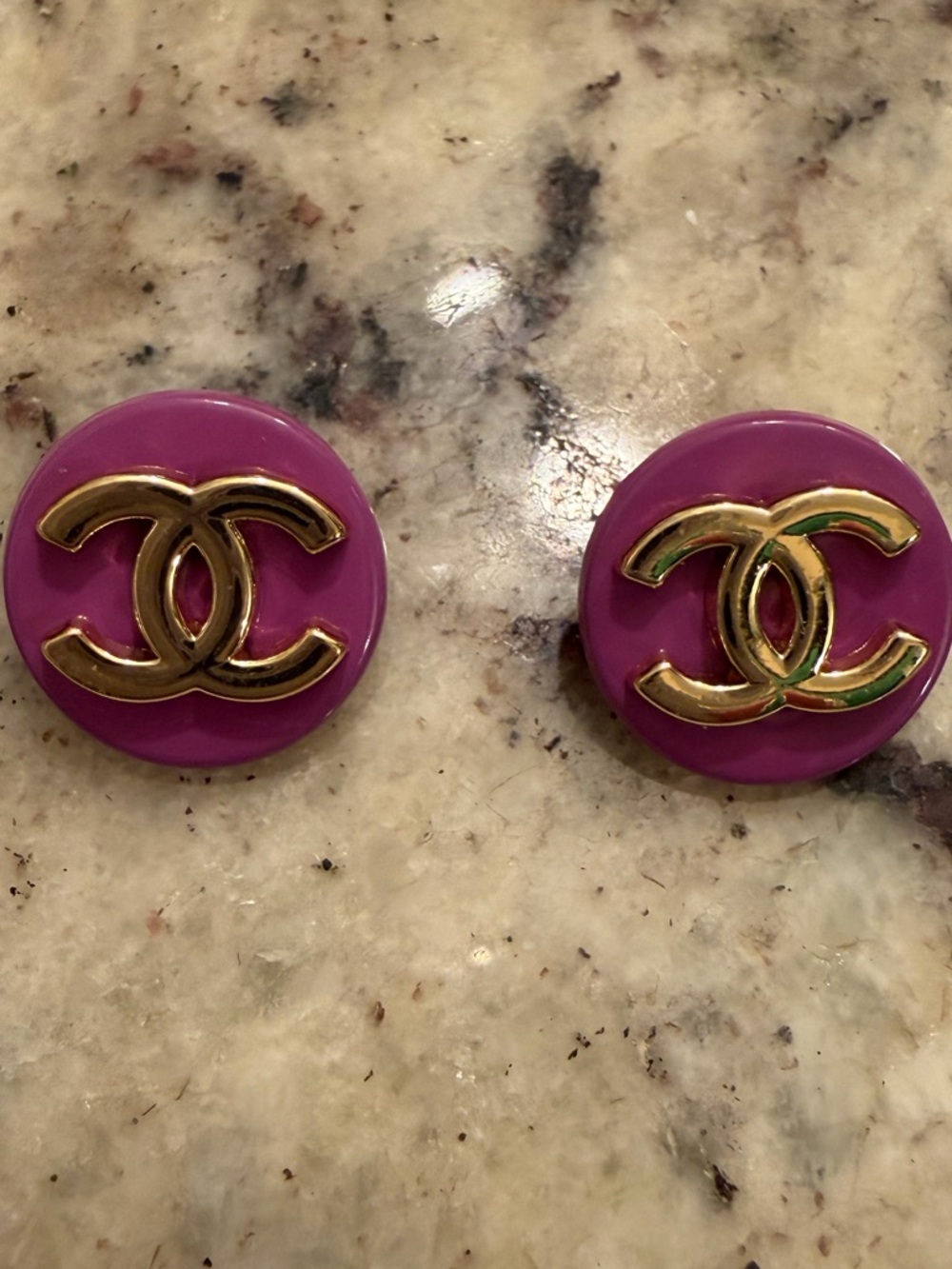 Two Chanel Buttons
